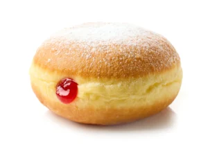 cross section of filled donuts showing cream, custard, and fruit jam interiors